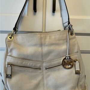 Michael Kors Cream Shoulder Bag with Adjustable Straps and Zipper Closures